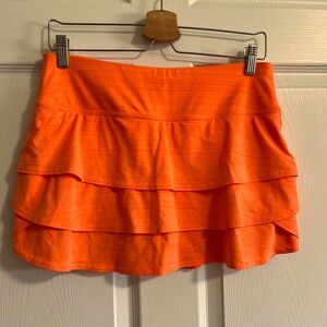 Women’s Juniors Athleta Swagger Skort, Peach/Orange, size Small